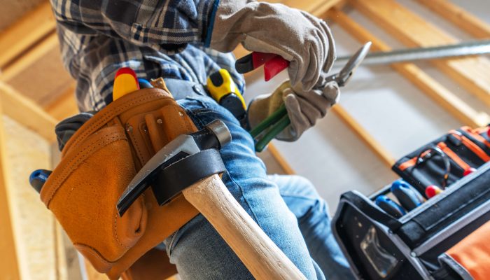 construction-worker-repairs-wood-framing-in-a-buil-2026-09-24-06-52-49-utc
