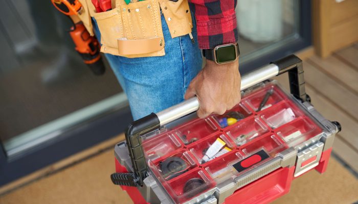handyman-with-toolbox-wearing-a-tool-belt-indoors-2026-09-22-17-53-49-utc